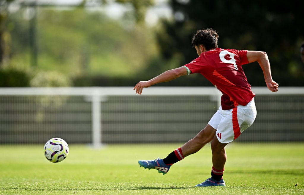 Gabe Biancheri of Manchester United scores his team's third goal from a penalty kick during the U18 Premier League Cup match between Tottenham Hots...