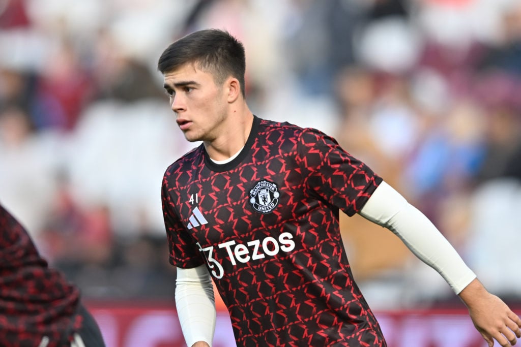 Harry Amass (41 Manchester United) warms up during the Premier League match between West Ham United and Manchester United at the London Stadium in...