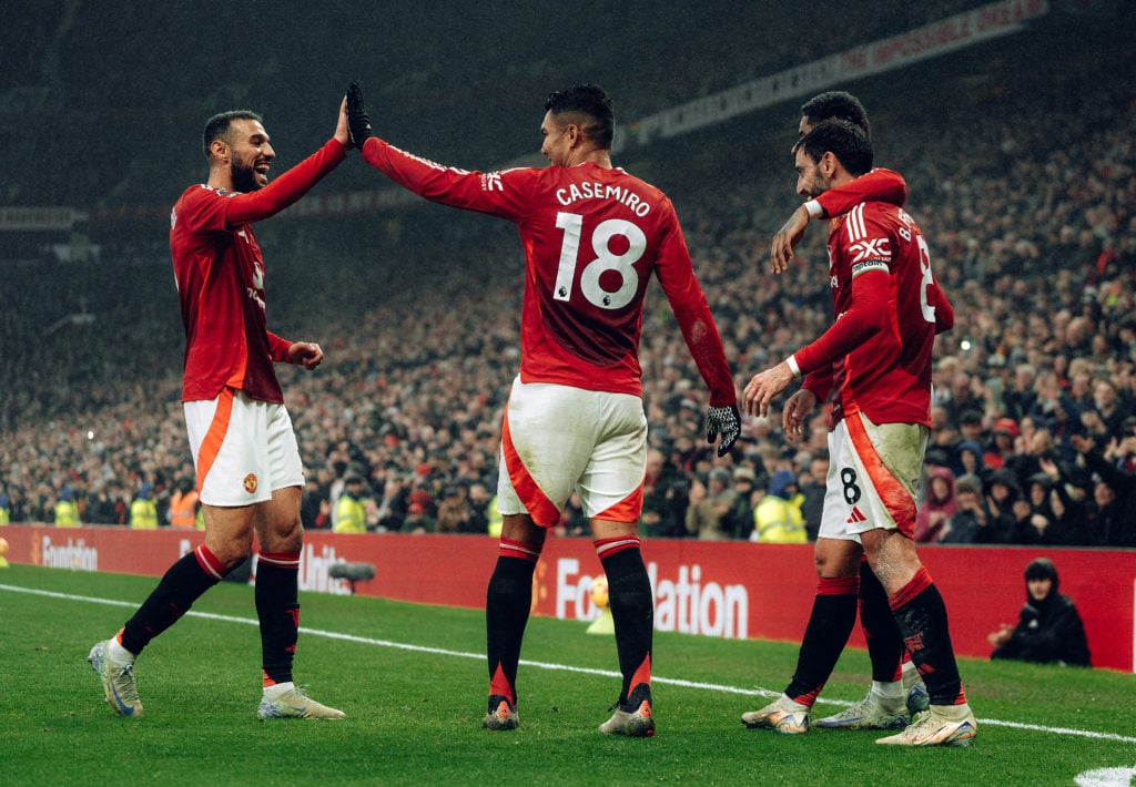 Manchester United's Bruno Fernandes celebrates scoring their second goal during the Premier League match between Manchester United FC and Leicester...