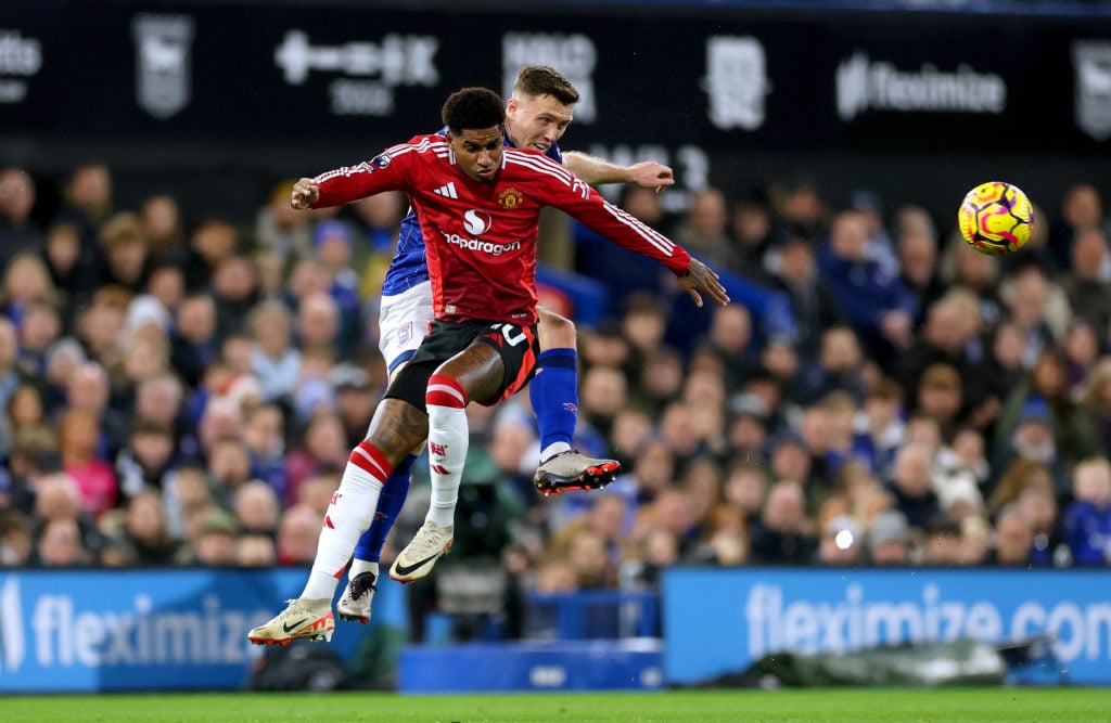 Marcus Rashford of Manchester United battles for possession with Dara O'Shea of Ipswich Town during the Premier League match between Ipswich Town F...