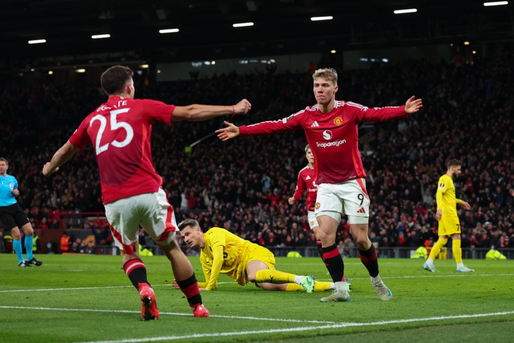 Rasmus Hojlund of Manchester United celebrates scoring the winning goal with Manuel Ugarte during the UEFA Europa League 2024/25 League Phase MD5 m...