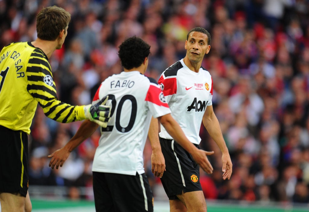 Rio Ferdinand of Manchester United argues with Edwin van der Sar and Fabio