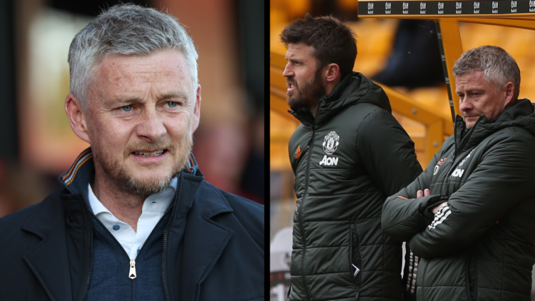 WOLVERHAMPTON, ENGLAND - MAY 23: Manager Ole Gunnar Solskjaer of Manchester United watches from the dugout during the Premier League match between ...