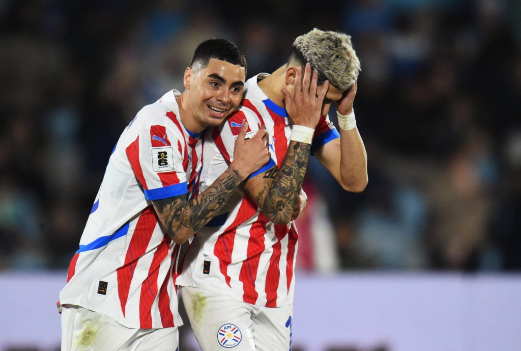 Paraguay's midfielder Miguel Almiron (L) and forward Julio Enciso react to a missed chance during the 2026 FIFA World Cup South American qualifiers...