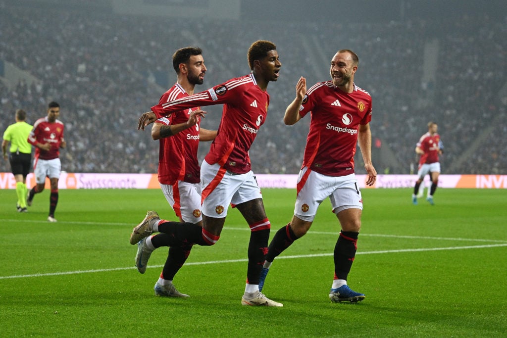 Marcus Rashford of Manchester United celebrates his team's first goal with teammates Bruno Fernandes and Christian Eriksen during the UEFA...