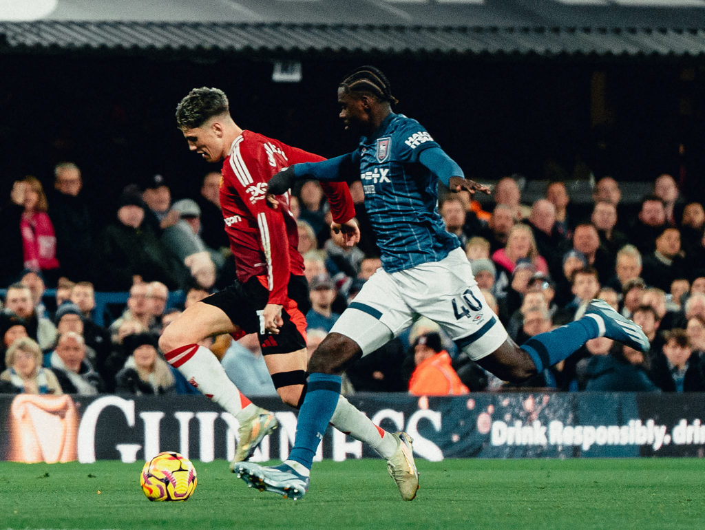 Ipswich Town's Axel Tuanzebe in action against Manchester United.