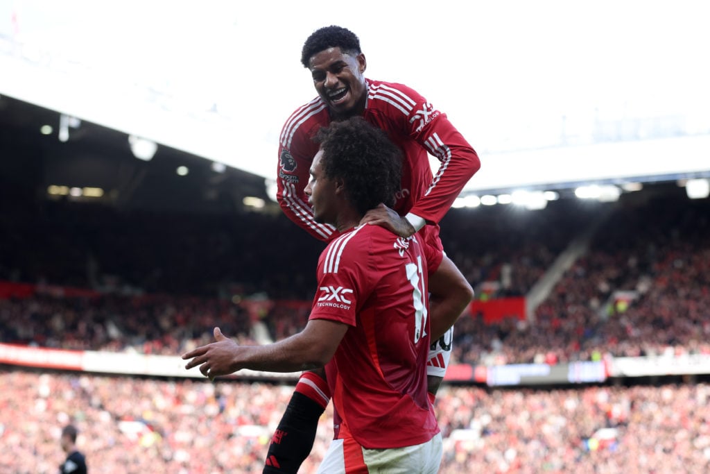 Joshua Zirkzee of Manchester United celebrates scoring his team's second goal with Marcus Rashford during the Premier League match between Manchest...