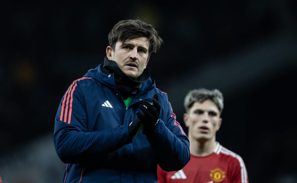 Manchester United's Harry Maguire applauds his side's travelling supporters at the end of the match during the Carabao Cup Quarter Final match betw...