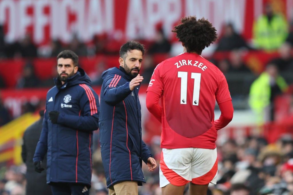 Ruben Amorim, Manager of Manchester United, interacts with Joshua Zirkzee of Manchester United during the Premier League match between Manchester U...