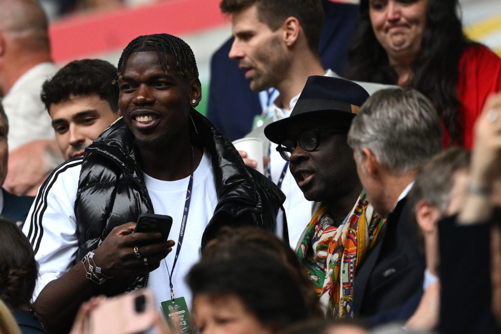 Paul Pogba and Lilian Thuram during the UEFA EURO 2024 round of 16 match between France and Belgium at Düsseldorf Arena on July 01, 2024 in Dusseld...