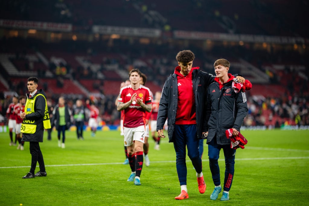 Ethan Wheatley and Jayce Fitzgerald of Manchester United interact following the UEFA Europa League 2024/25 League Phase MD4 match between Mancheste...