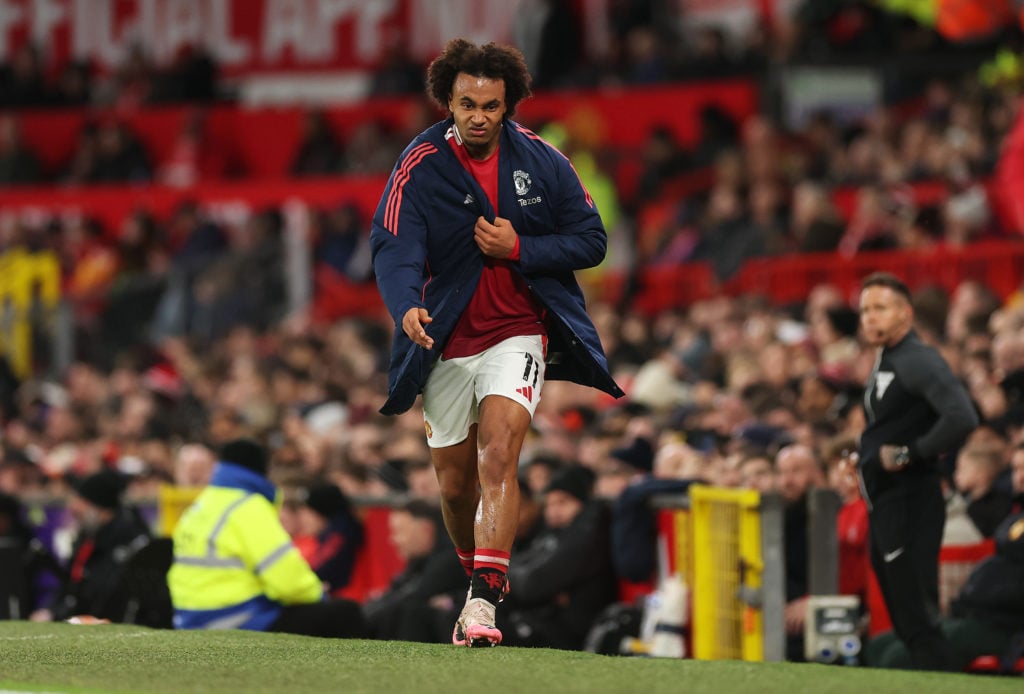 Joshua Zirkzee of Manchester United heads towards the changing room after been substituted after 33 minutes during the Premier League match between...