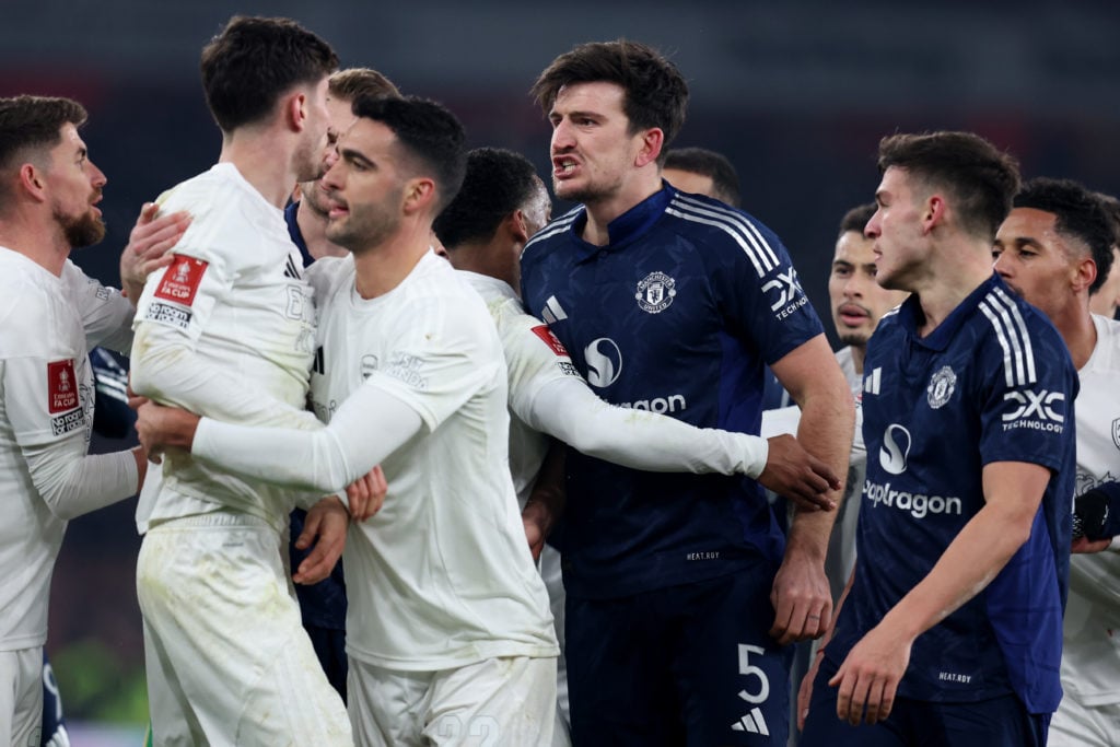 Harry Maguire of Manchester United confronts Kai Havertz of Arsenal after a penalty decision went against Manchester United during the Emirates FA ...