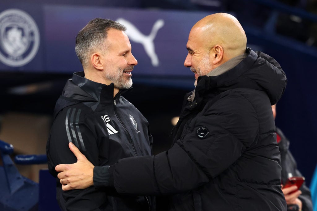 Manchester City manager Josep Guardiola greets Salford City manager assistant manager Ryan Giggs ahead of the Emirates FA Cup Third Round match be...