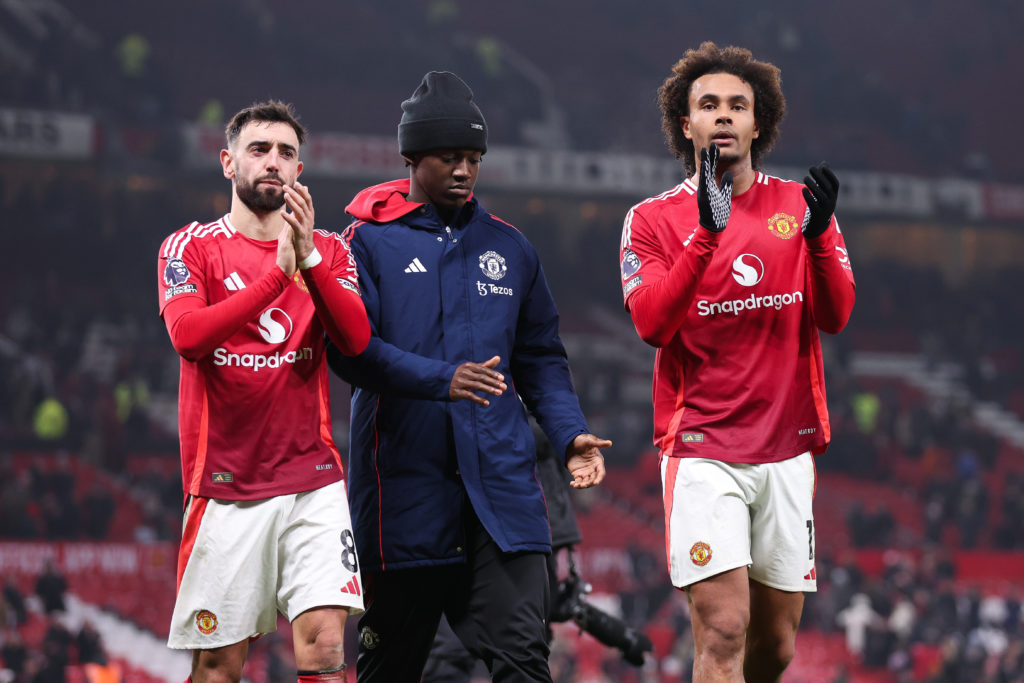 Bruno Fernandes, Kobbie Mainoo and Joshua Zirkzee of Manchester United acknowledge the home support after the Premier League match between Manchester United FC and Southampton FC at Old Trafford on January 16, 2025 in Manchester, England.