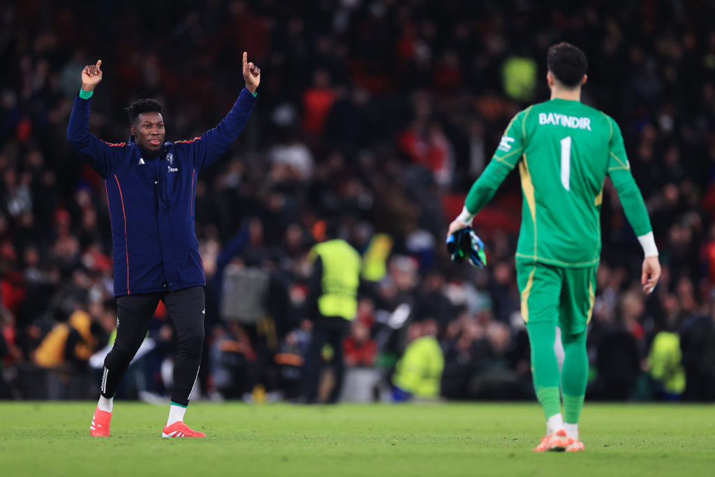 Andre Onana celebrates with Altay Bayindir after Manchester United performance.