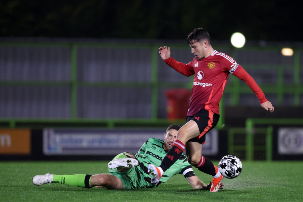 Dan Gore of Manchester United battles for the ball during the U21 National League Cup match between Forest Green Rovers and Manchester United at Th...