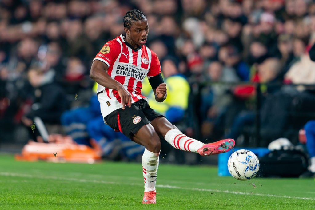 Tyrell Malacia of PSV passes the ball during the Dutch Eredivisie match between PSV and Willem II at Philips Stadion on February 8, 2025 in Eindhov...