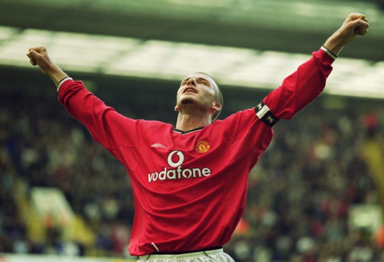 29 Sep 2001:  Manchester United Captain David Beckham celebrates scoring Man Utd's 5th goal during the FA Barclaycard Premiership match against Tot...