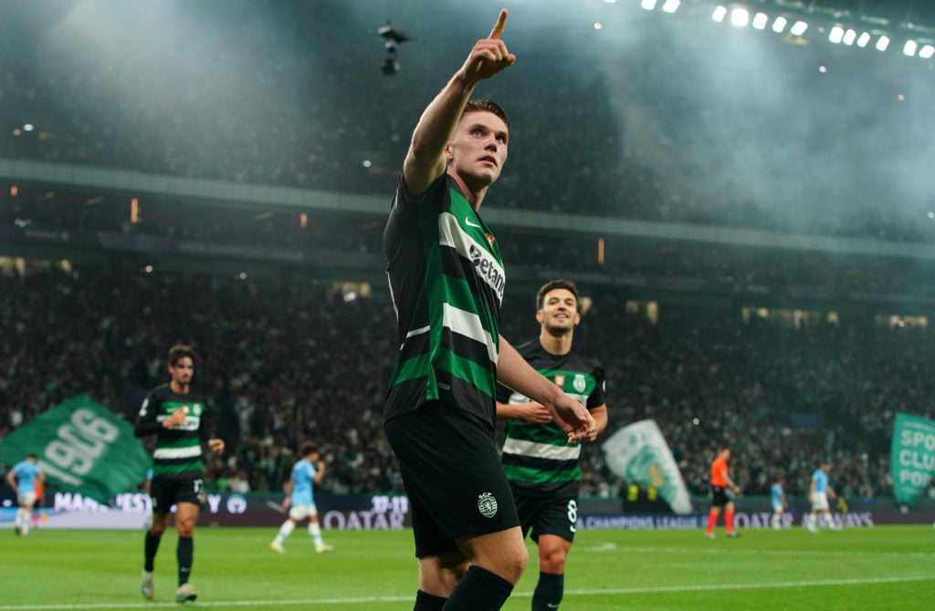 Viktor Gyokeres points toward crowd in celebration.