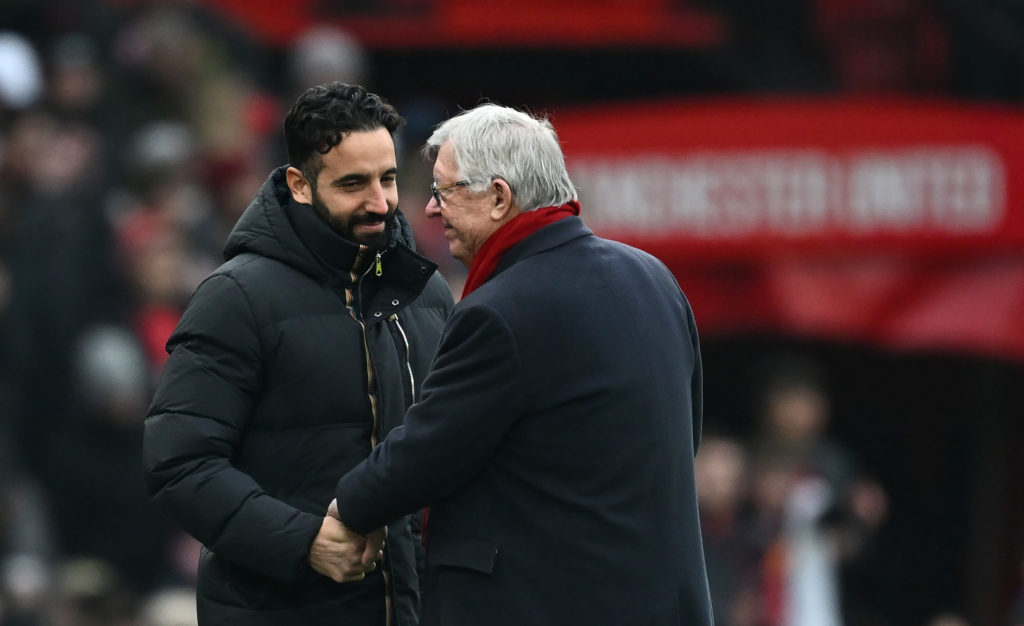 Ruben Amorim, manager of Manchester United, interacts with Sir Alex Ferguson, former manager of Manchester United, prior to the Premier League match between Manchester United FC and Brighton and Hove Albion FC at Old Trafford on January 19, 2025 in Manchester, England.