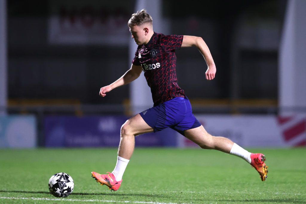 Finley McAllister of Manchester United warms up prior to the National League Cup match between Sutton United & Manchester United U21 at Gander Green Lane on February 25, 2025