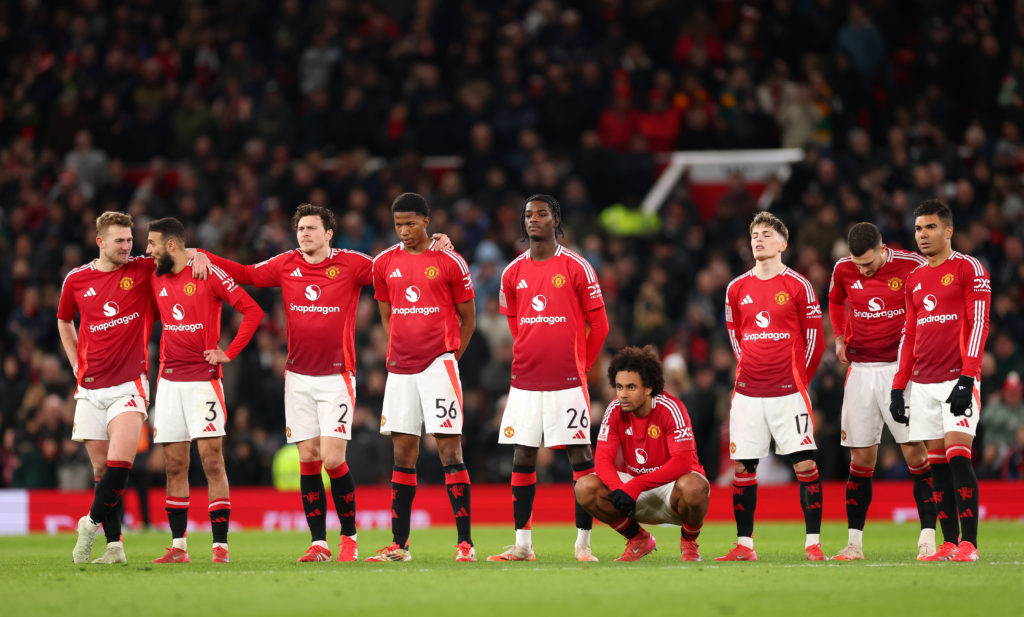 Manchester United team line up during penalty shootout.