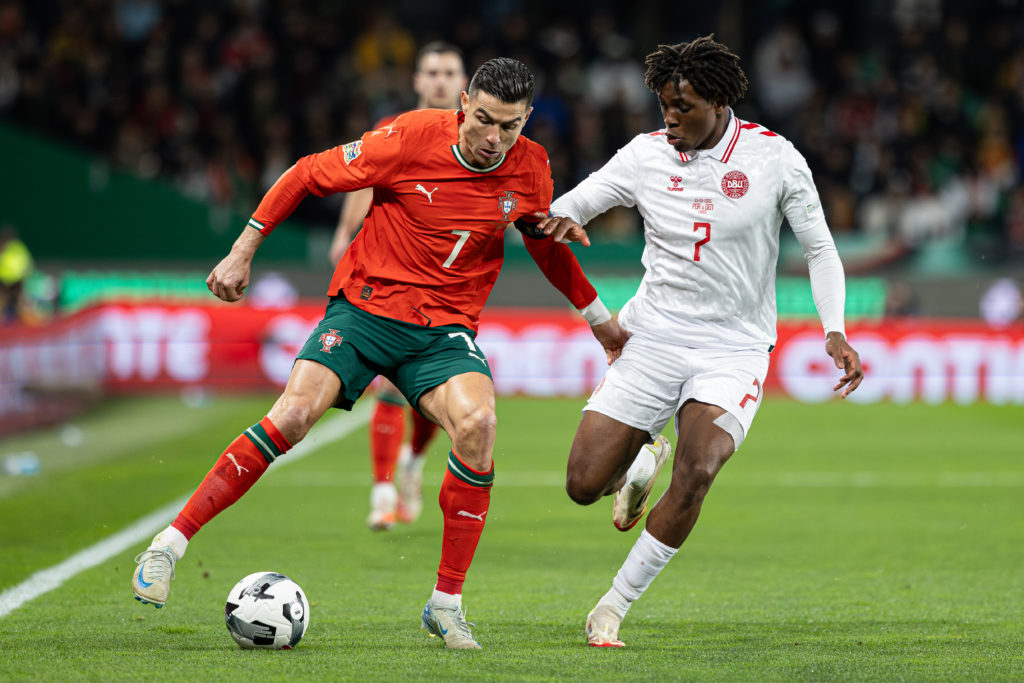 (L-R) Cristiano Ronaldo of Portugal and Patrick Dorgu of