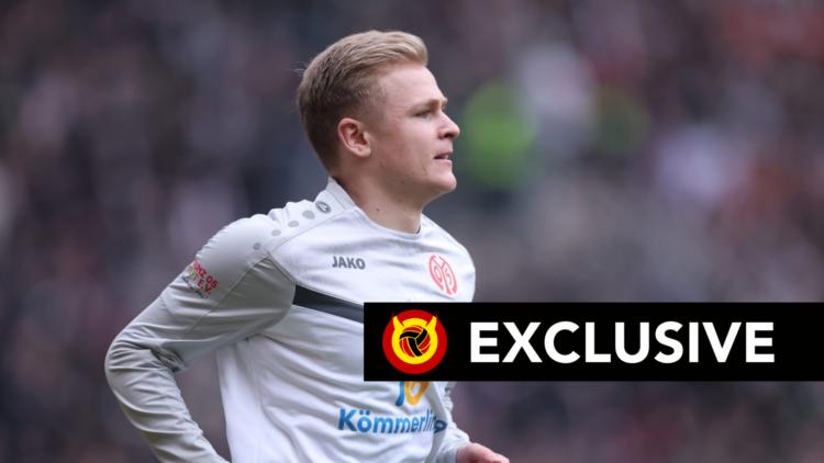 Jonathan Burkardt in action for Mainz. United In Focus exclusive banner overlaid.