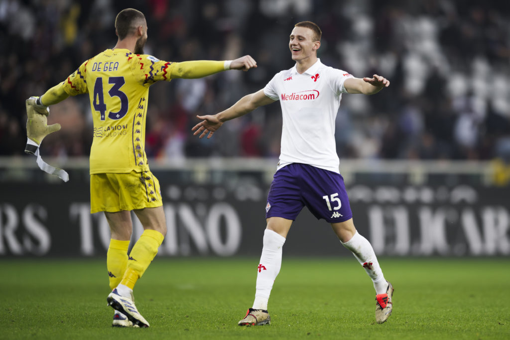 Pietro Comuzzo (R) of ACF Fiorentina celebrates with David