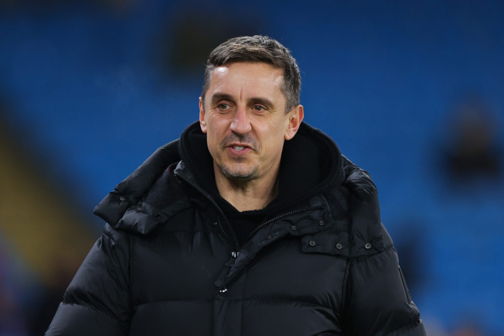 Gary Neville wearing thick black coat