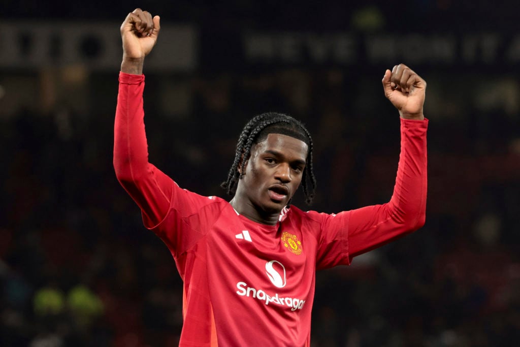 Ayden Heaven with arms raised for Manchester United.