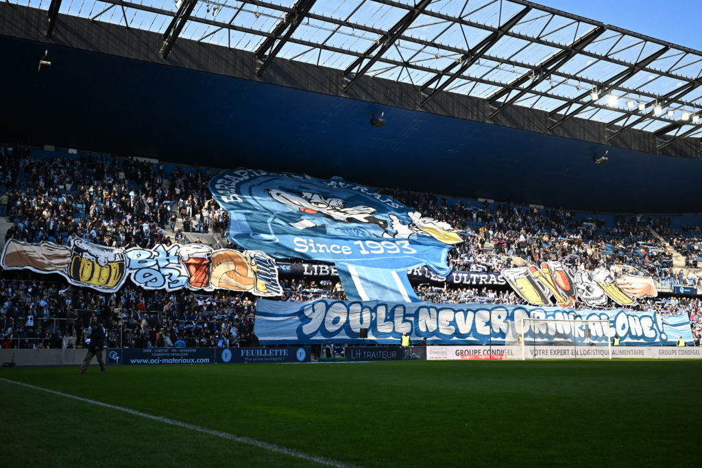 Havre supporters flying flags.