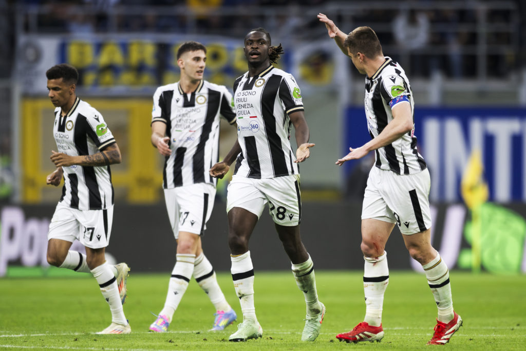 Oumar Solet (2nd from R) of Udinese Calcio celebrates with