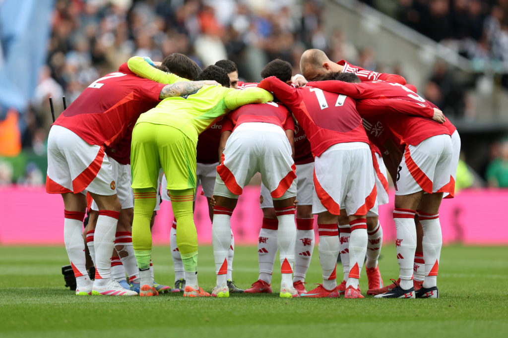 Manchester United players huddle prior to the Premier League match between Newcastle United and Manchester United at St James’ Park in 2025 in Newcastle upon Tyne.
