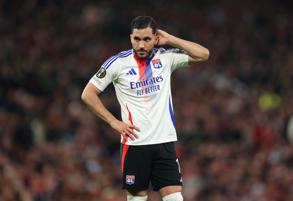 Rayan Cherki playing for Lyon, looking dejected
