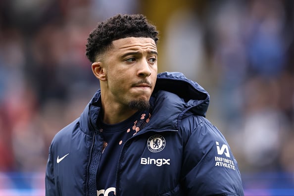 Jadon Sancho on the sidelines during Chelsea vs Fulham.