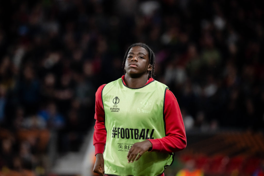 Godwill Kukonki warming up for Manchester United in Europa League