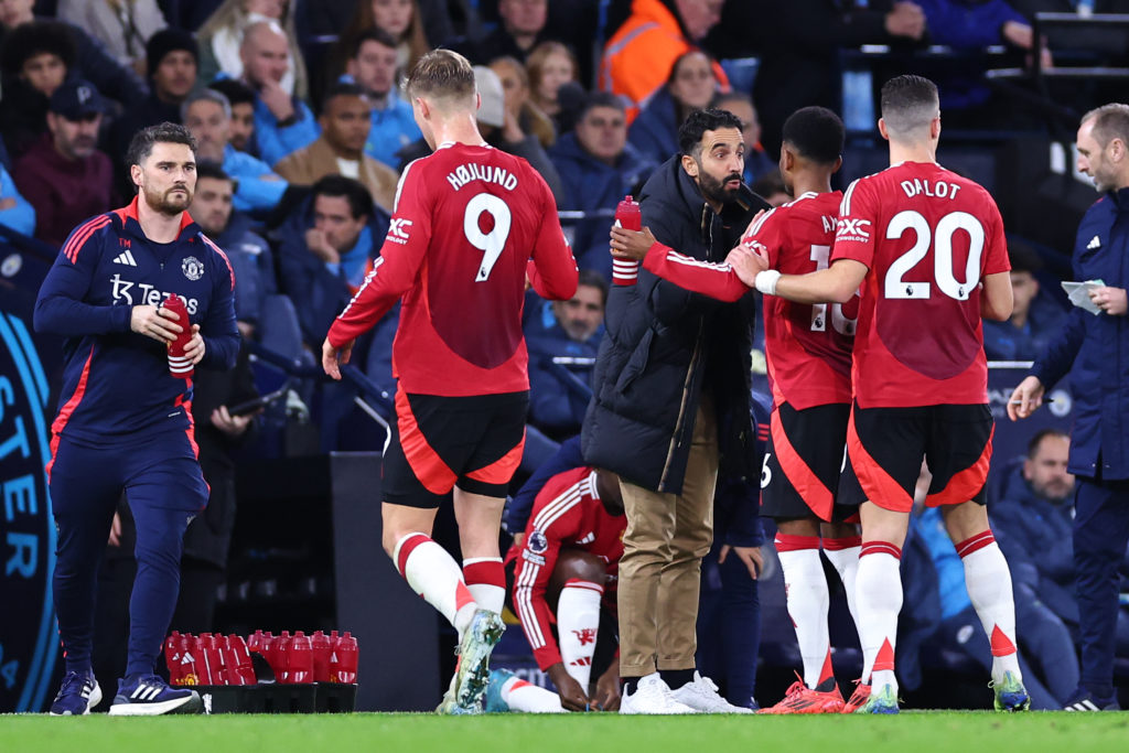 Manchester United manager Ruben Amorim instructs Amad Diallo during the Premier League match between Manchester City and Manchester United at the Etihad Stadium in 2024 in Manchester.