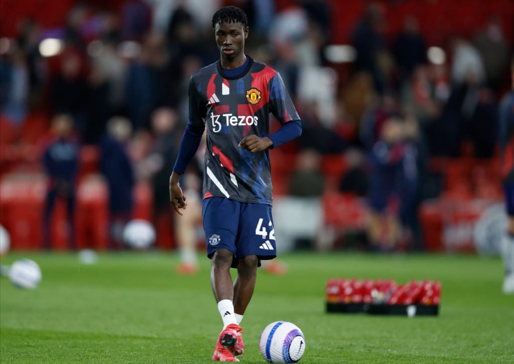 Manchester United midfielder Sekou Kone warming up.