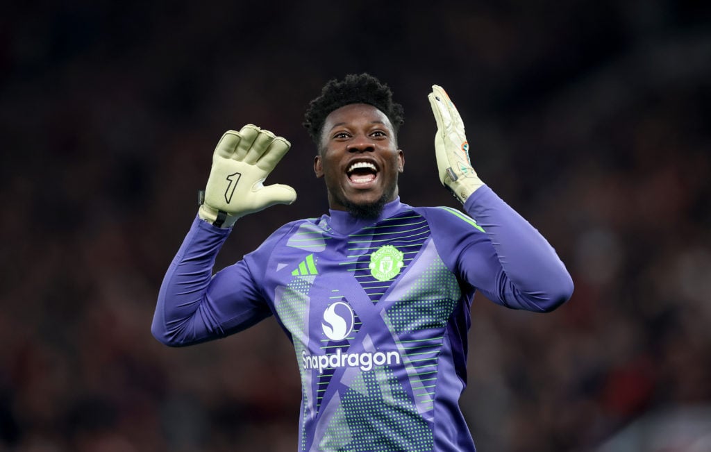 Manchester United goalkeeper Andre Onana facing Lyon.
