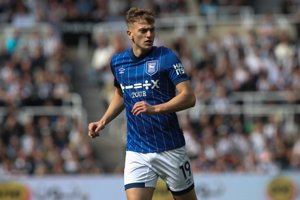 Liam Delap running while playing for Ipswich Town.