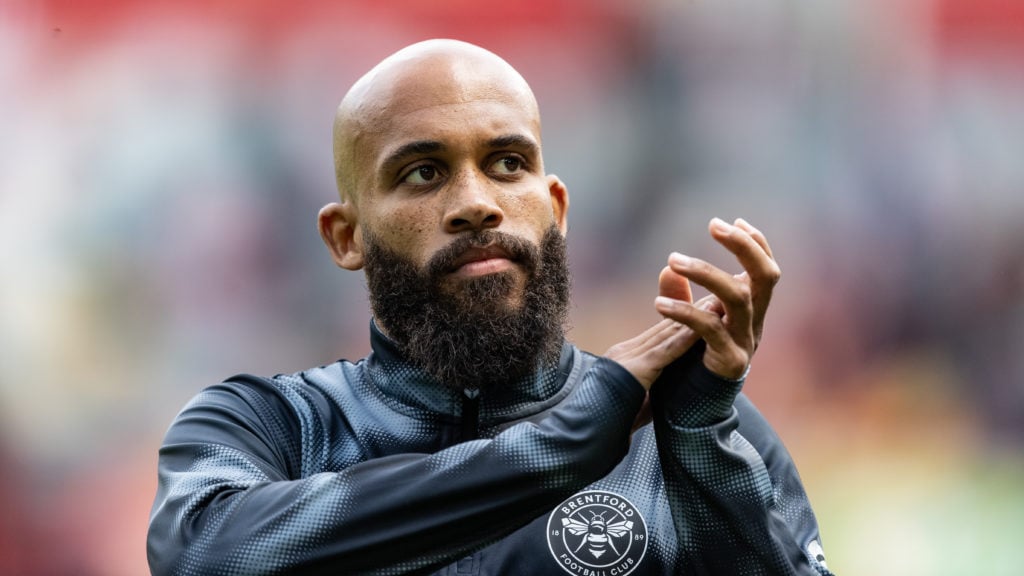 Brentford winger Bryan Mbeumo applauds crowd before facing Fulham.