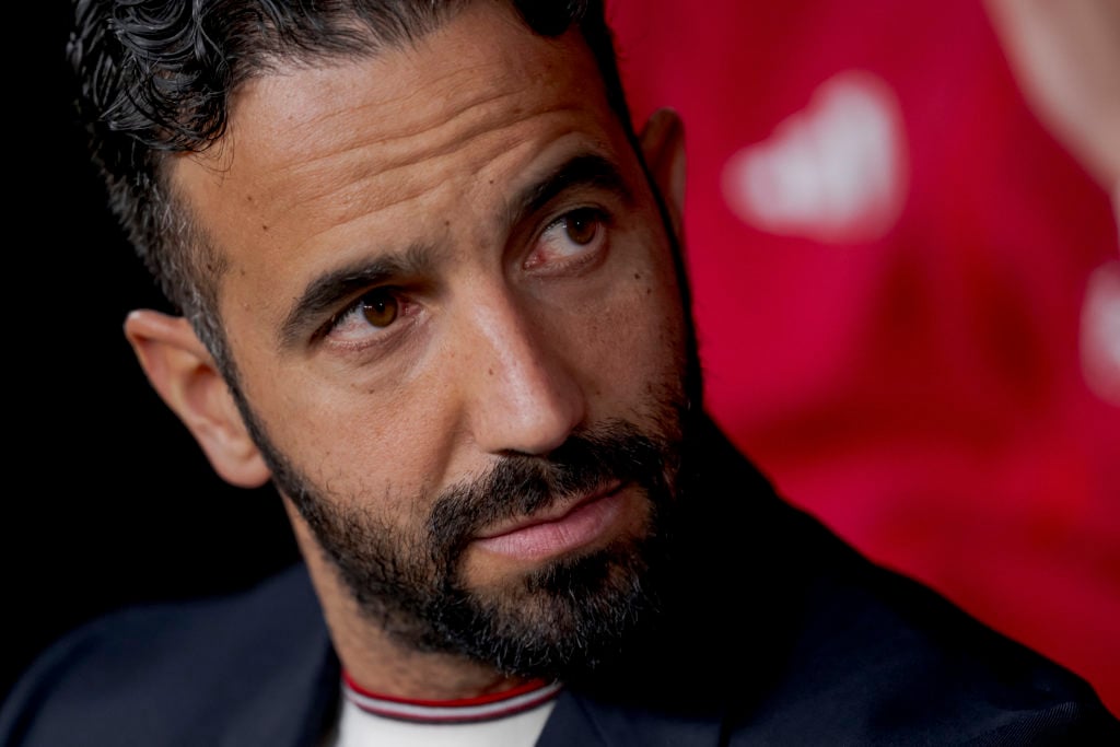 Ruben Amorim in deep thought in the dugout for Manchester United.
