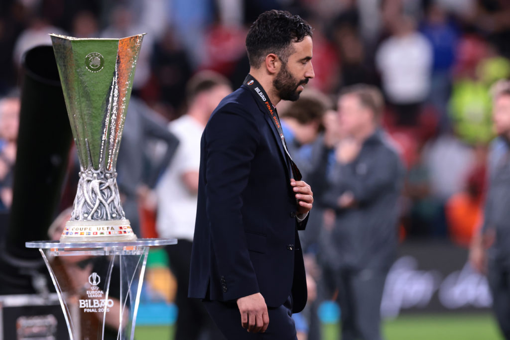 Ruben Amorim walks past the Europa League trophy after Manchester United's 1-0 defeat to Tottenham in Bilbao