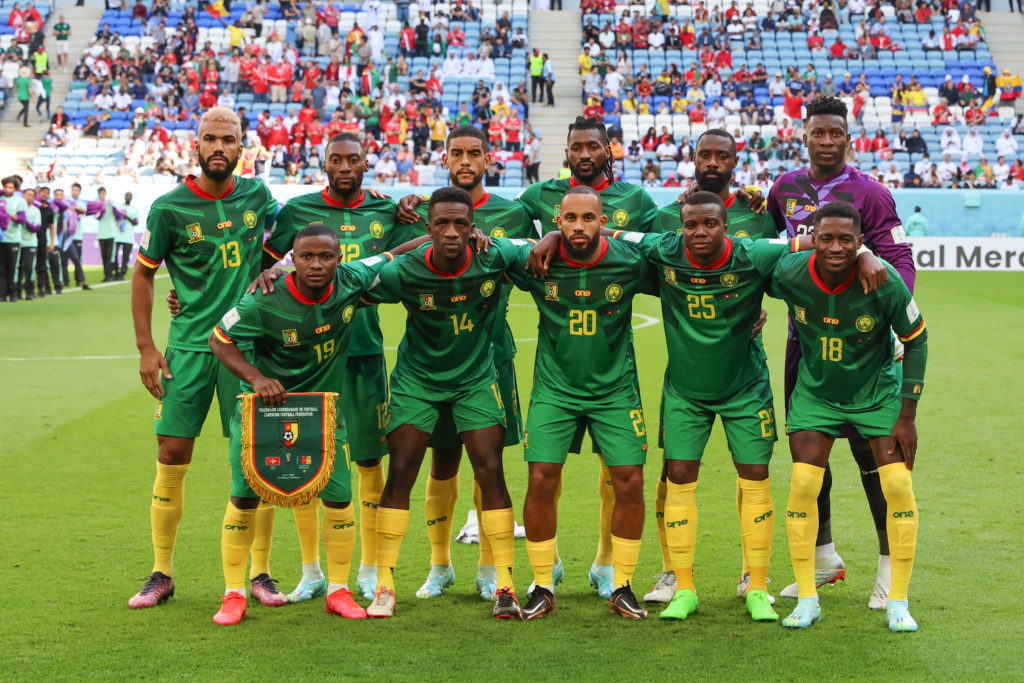 The Cameroon national squad pose for a picture, featuring Andre Onana as goalkeeper
