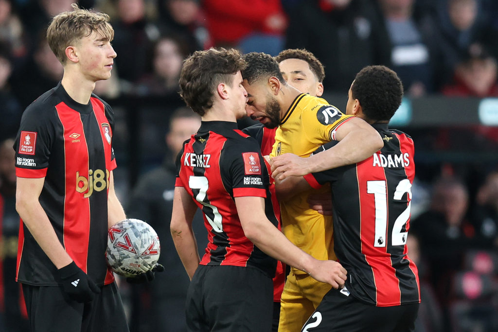 Wolves star Matheus Cunha clashes with Milos Kerkez in the FA Cup.