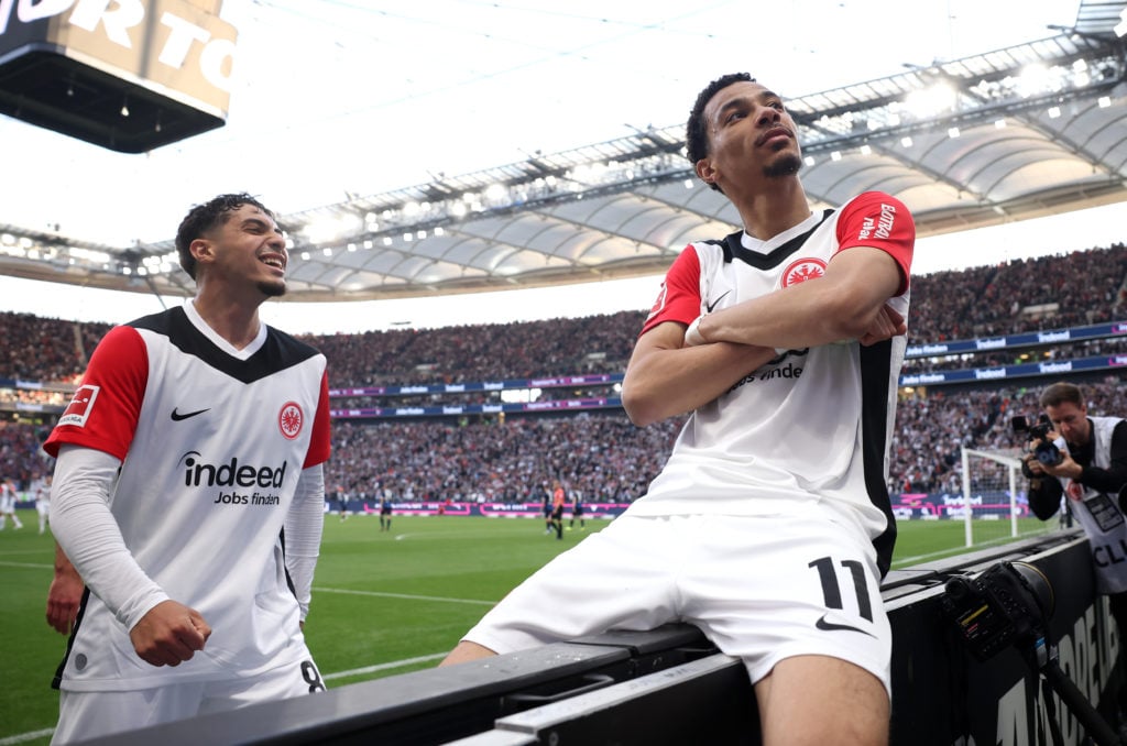 Hugo Ekitike of Eintracht Frankfurt celebrates scoring his team's third goal with teammate Fares Chaibi during the Bundesliga match between Eintracht Frankfurt and 1. FC Heidenheim