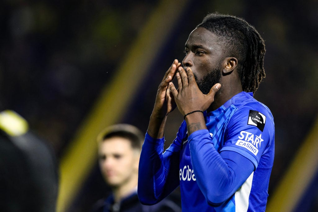Genk forward Tolu Arokodare greets fans against Union Saint-Gilloise.