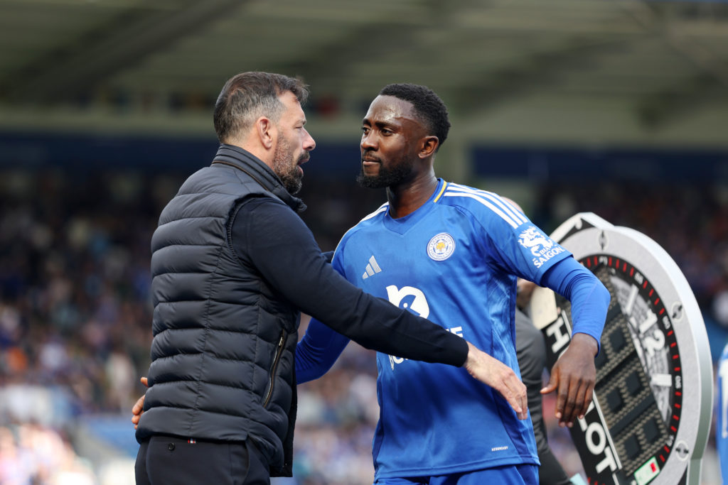 Ruud Van Nistelrooy and Wilfred Ndidi embrace after substitution.